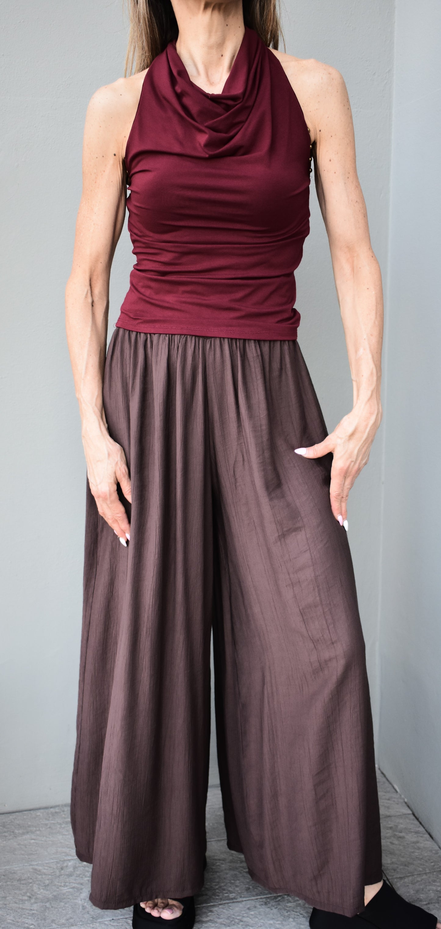 top borchie schiena nuda